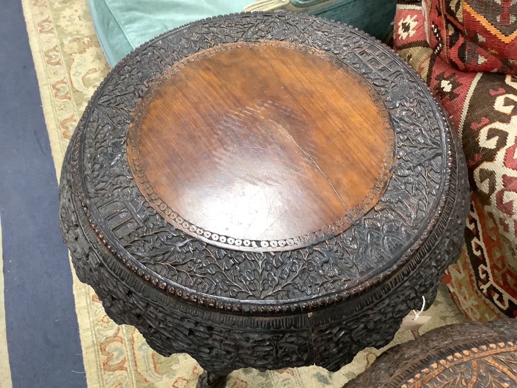 A near pair of 19th century Indian padouk tripod tables, 62cm diameter, height 70cm